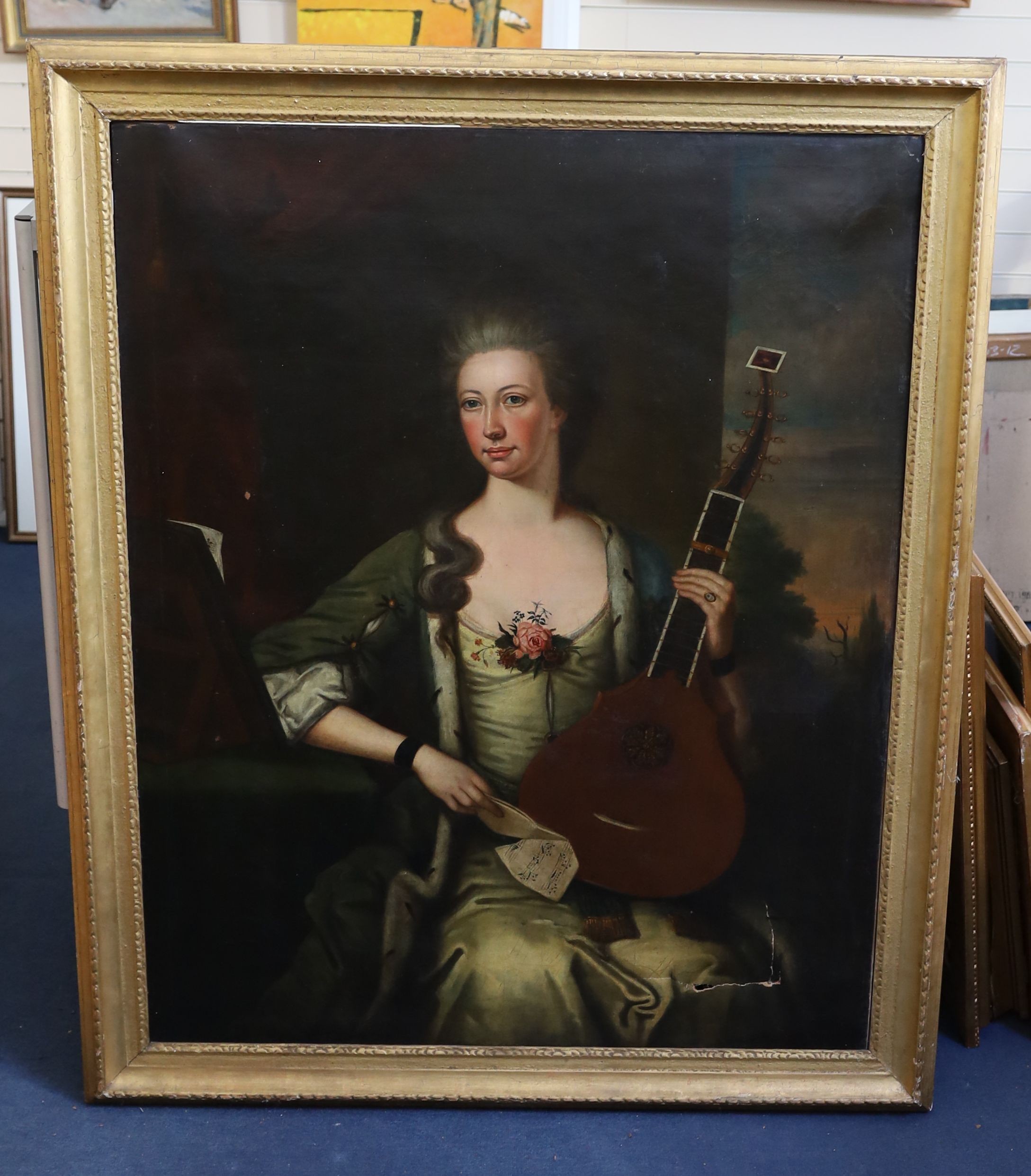 English School c.1770 , Three quarter length portraits of Mr and Mrs Peel, he seated at a table with a globe, she in a landscape holding citern, pair of oils on canvas, 125 x 100cm